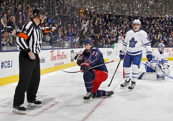 Columbus Blue Jackets right wing Josh Anderson celebrates his first of two goals in front of Toronto Maple Leafs defenseman Jake Gardiner during the first period of their NHL hockey game at Nationwide Arena in Columbus.  (Adam Cairns / The Columbus Dispatch)